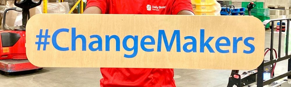 Image of hands holding a #changemakers sign