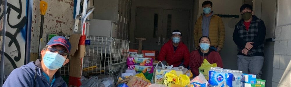 Image of young people with donation boxes